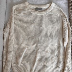 Cream colored knitted sweater